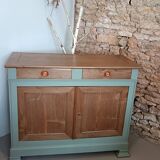 Buffet made of natural wood and bronze green.