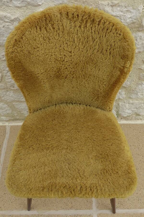 1950s compass foot sheepskin chair covered in sheepskin fabric