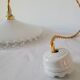Toothed opaline suspension