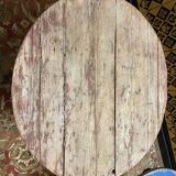 Wrought iron garden table with round top