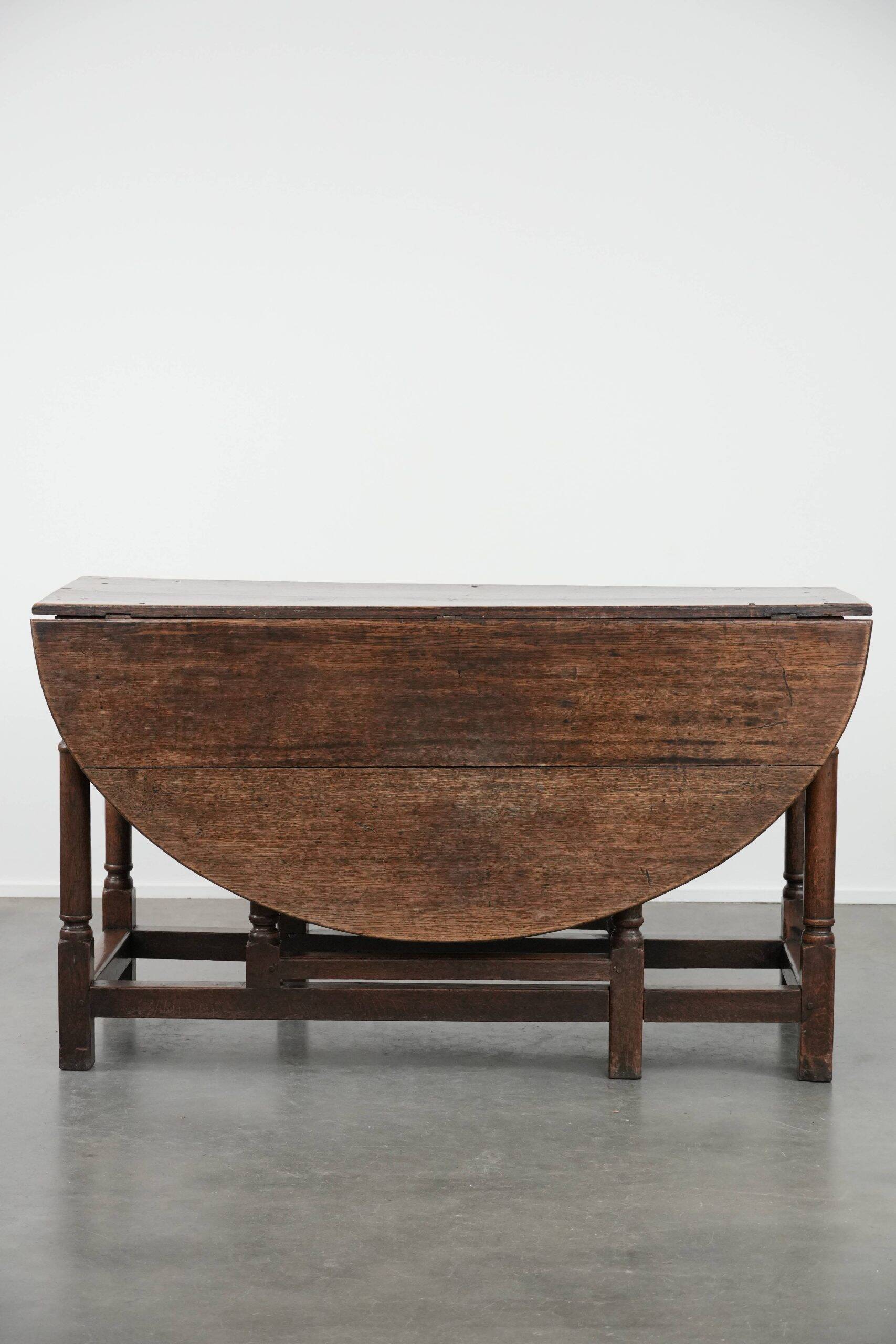 Antique English oak side/dining/gateleg table from the 18th century