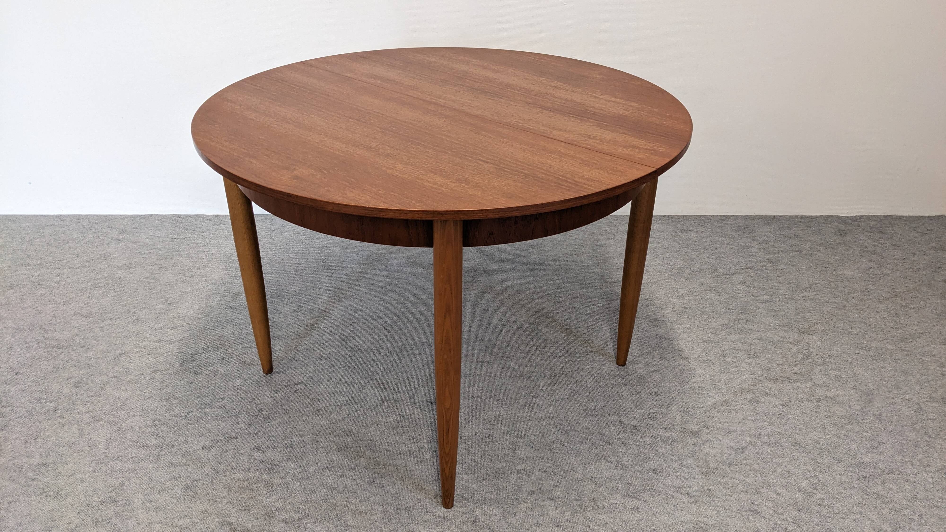 Extendable round table in Scandinavian style made of teak, France circa 1960.
