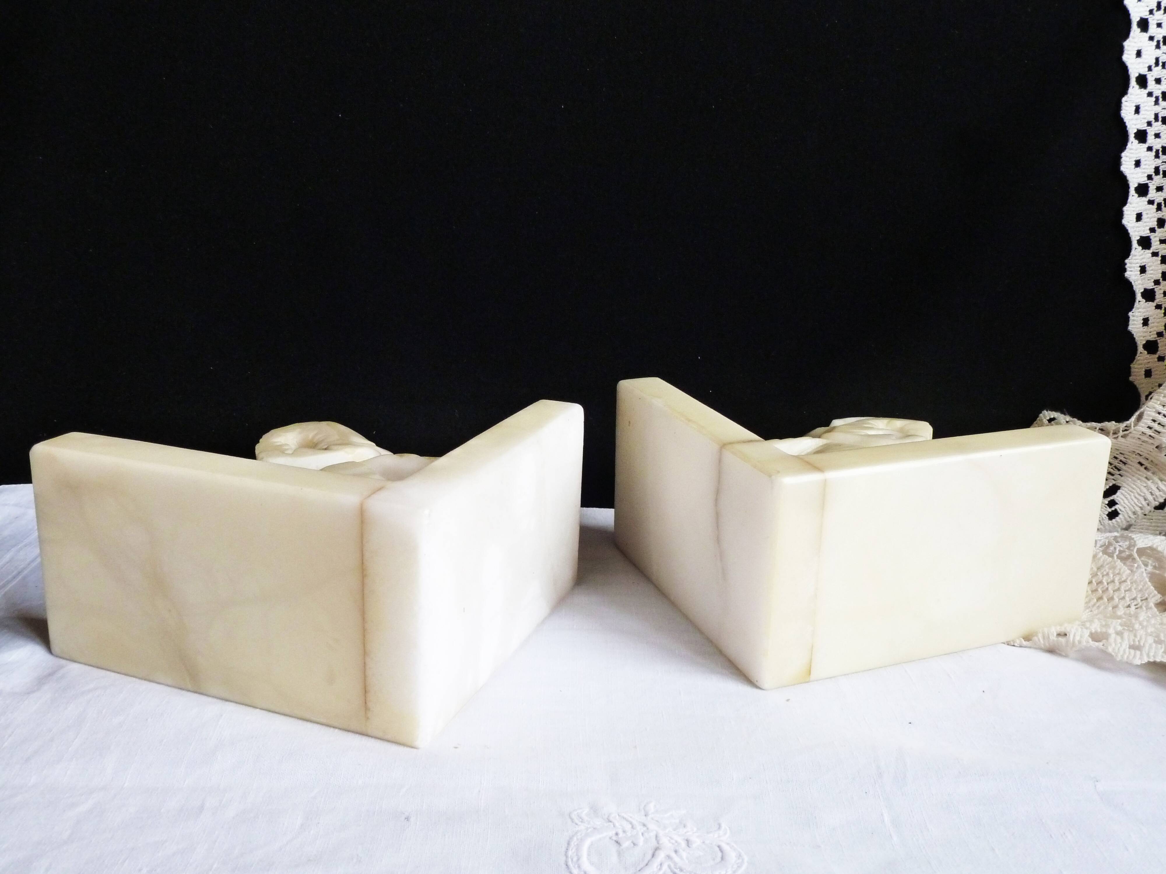 Elephant bookends in alabaster, Pair of elephant bookends.
