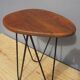 Tripod coffee table base pin