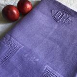 Old damask tablecloth in linen and iris silk