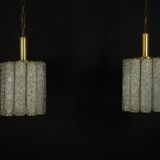 Pair of Murano glass and brass chandeliers