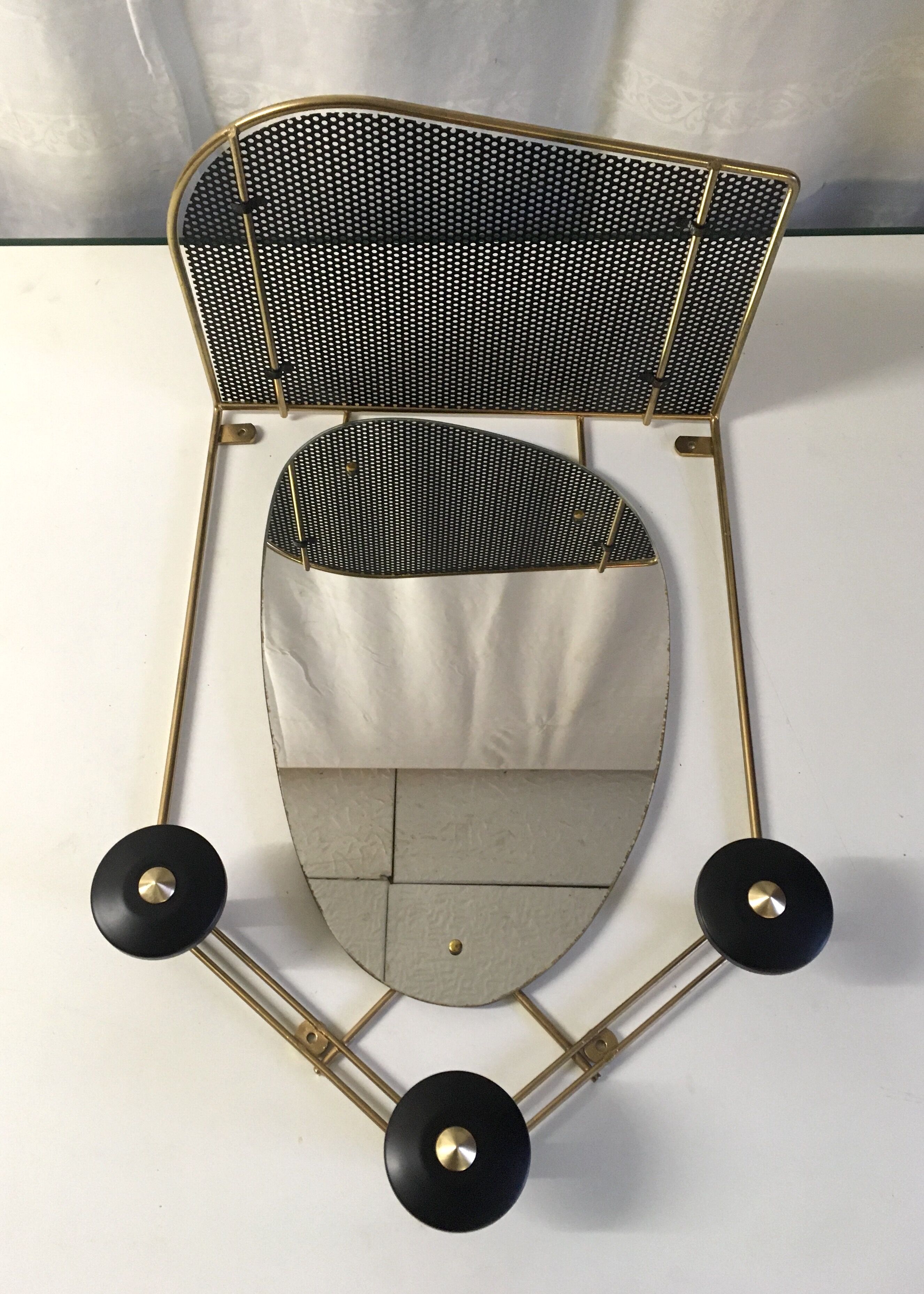 Black and gold metal coat rack., 1950