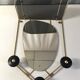 Black and gold metal coat rack., 1950