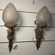 Pair of torch wall lights in Louis XVI style in 19th-century bronze.