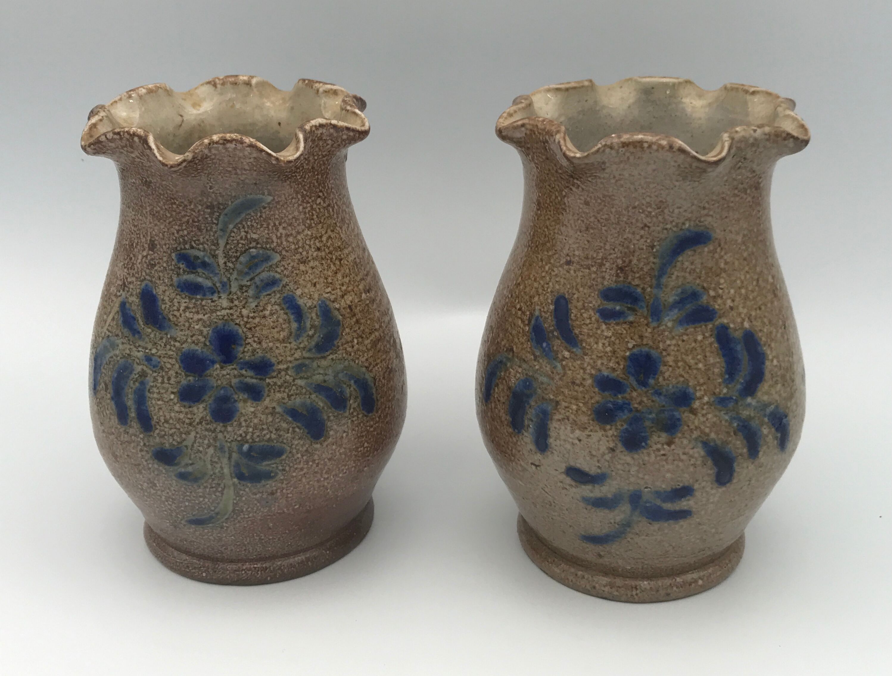 Pair of vintage pottery vases with floral decoration and glaçureau sel