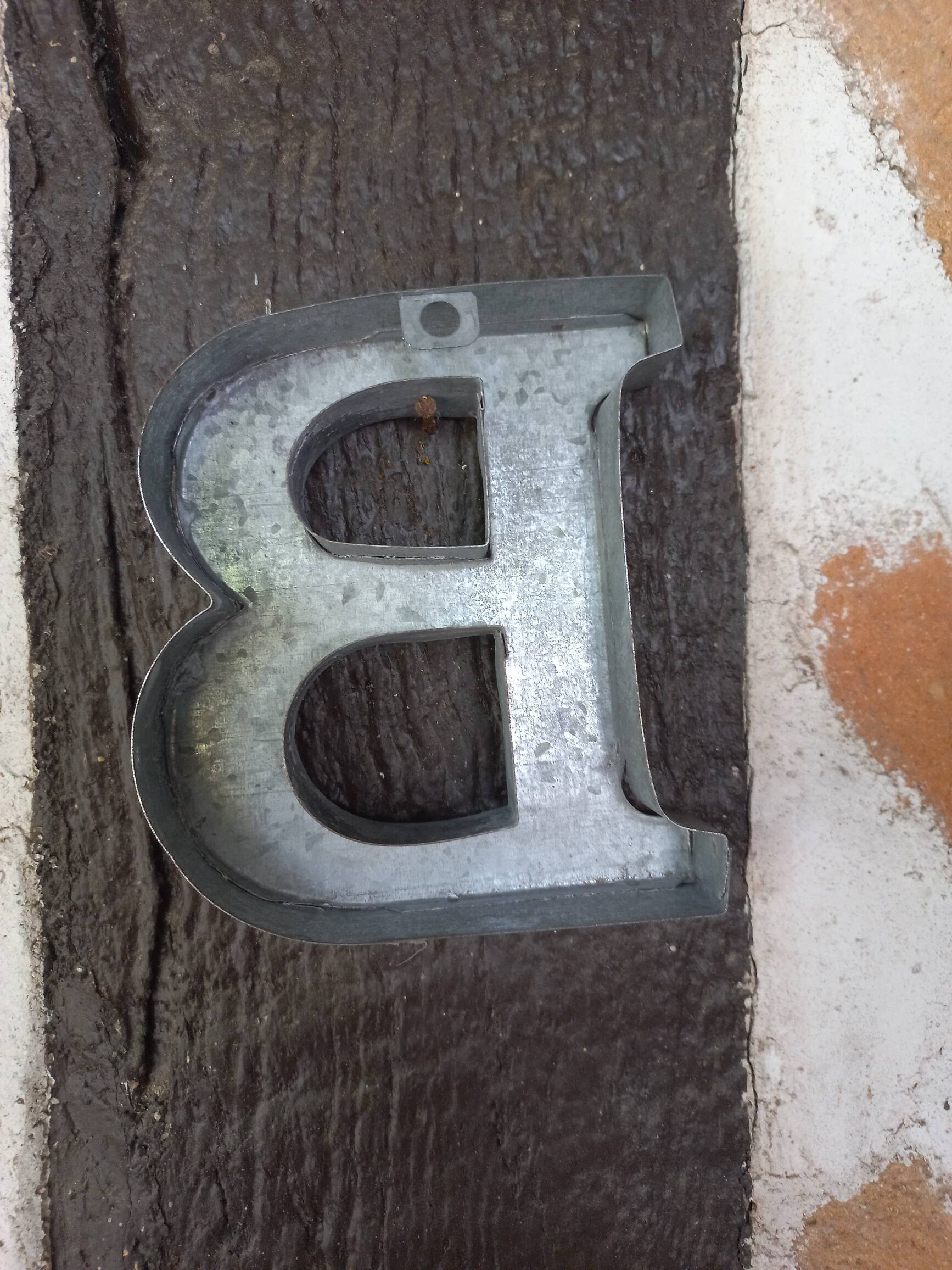 Letter B in zinc