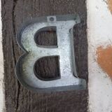 Letter B in zinc