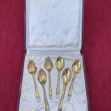 Set of golden metal spoons