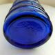 cobalt blue molded glass bottle in relief decoration bunches of grapes