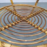 1960s Italian rattan coffee table with glass top, mid-century round design