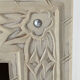 Miroir en bois sculpté