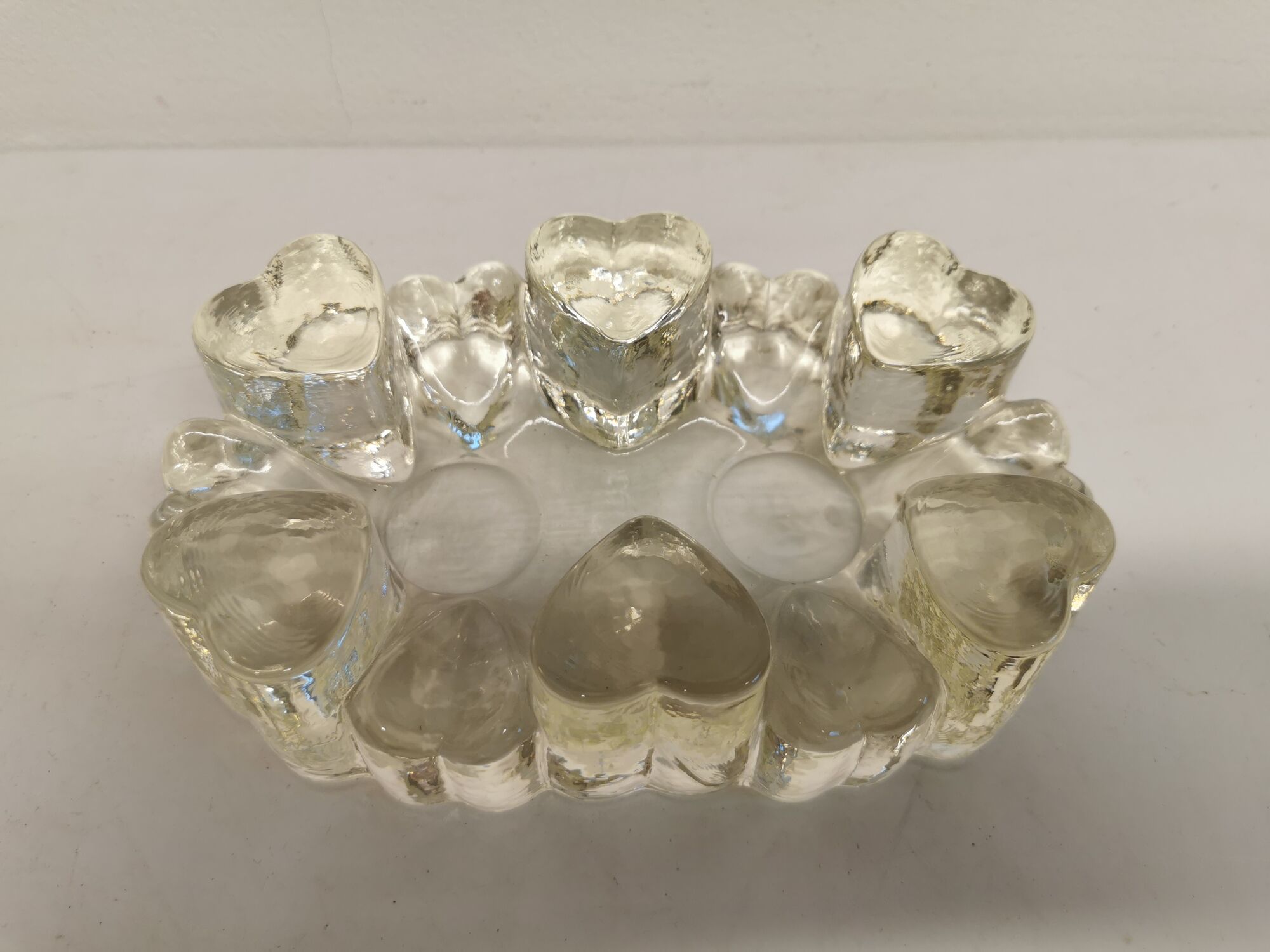 Candlestick in hard pressed glass with space for two candles