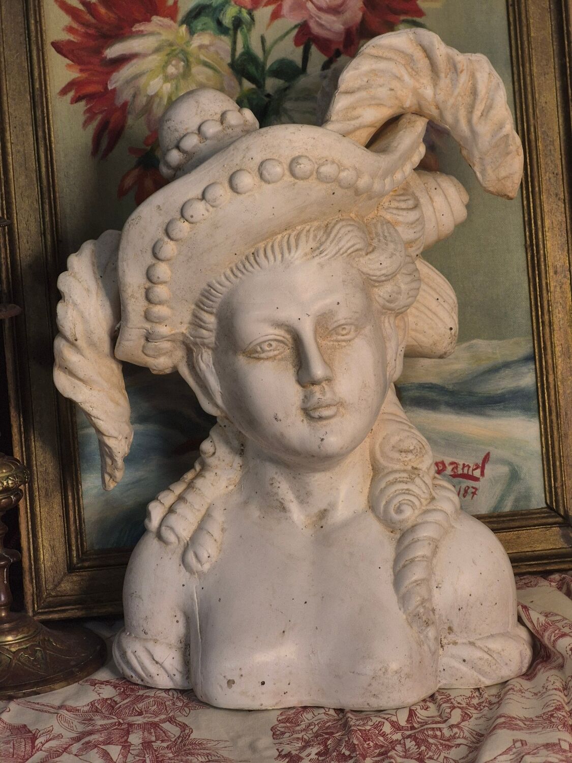 Bust of a woman with a hat