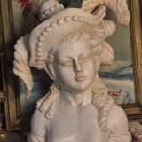 Bust of a woman with a hat