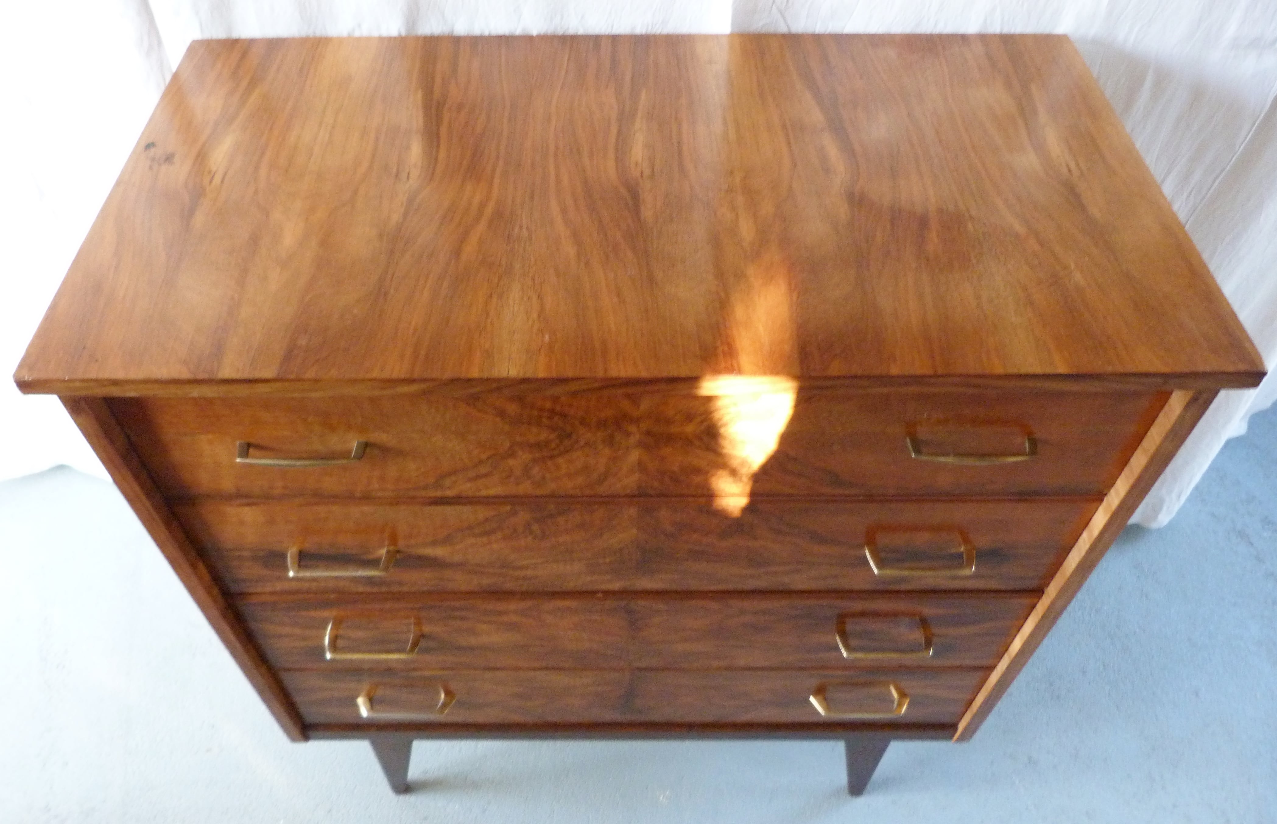 Compass feet chest of drawers