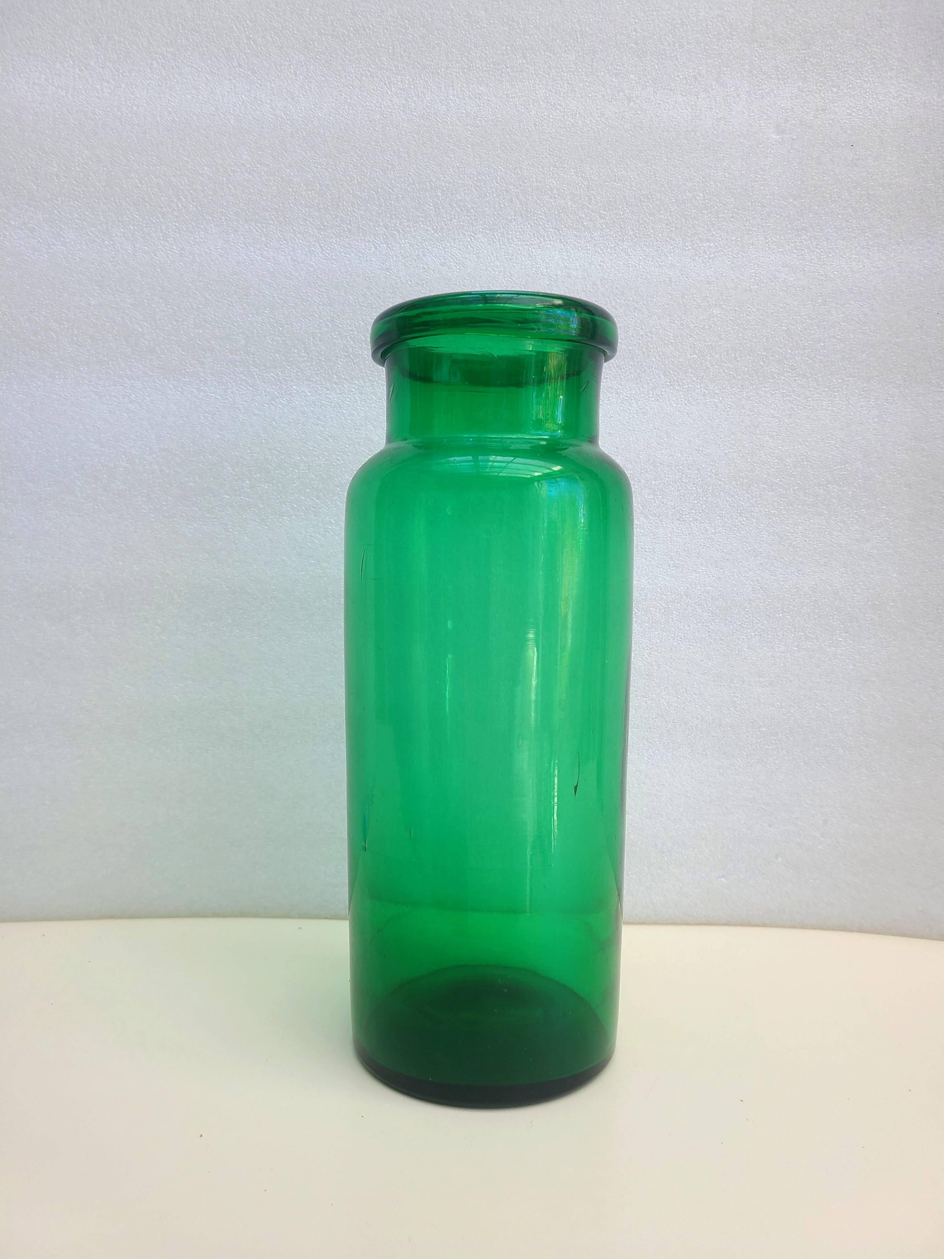 Antique green glass pharmacy jar