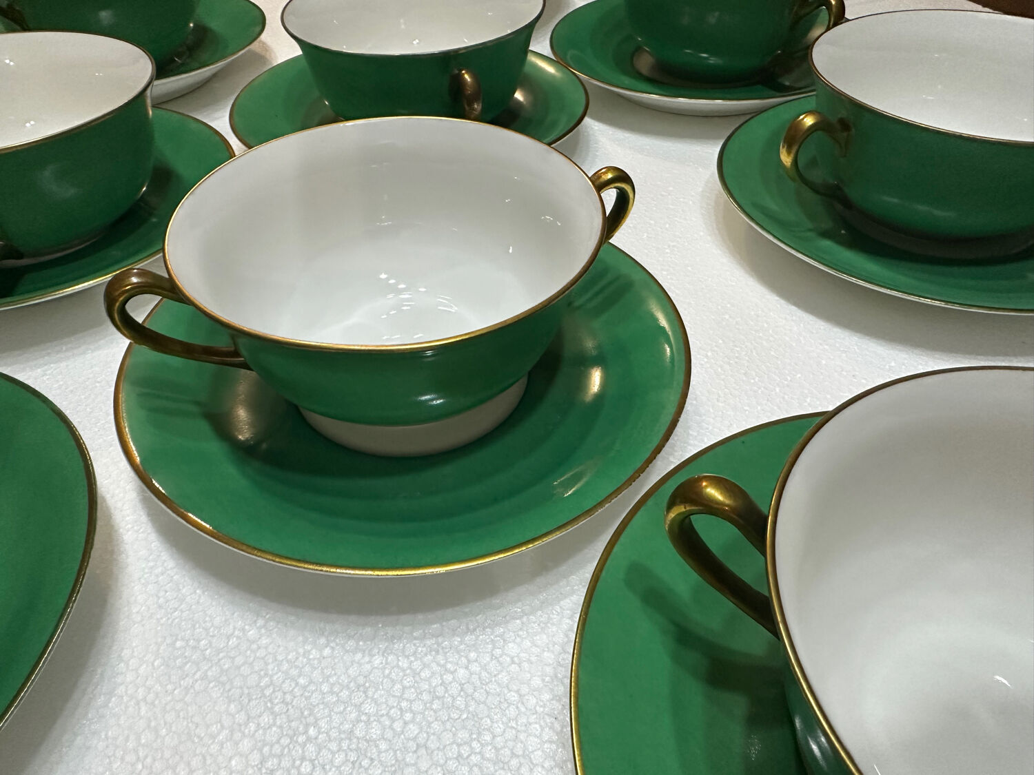 Service 14 cup and saucer in Art Deco Emerald Green and Gold.