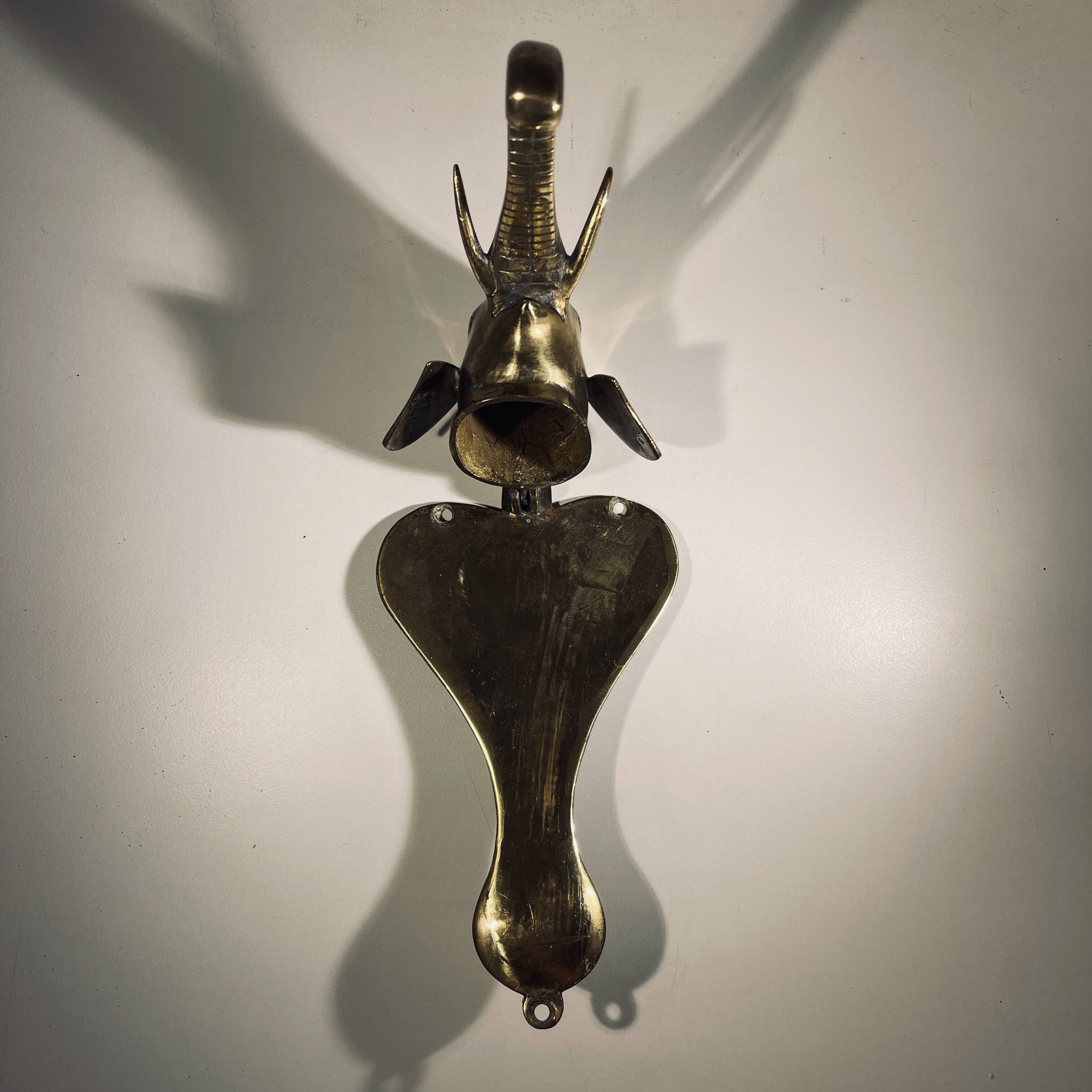 Door knocker / wall paperweight, bronze elephant sculpture