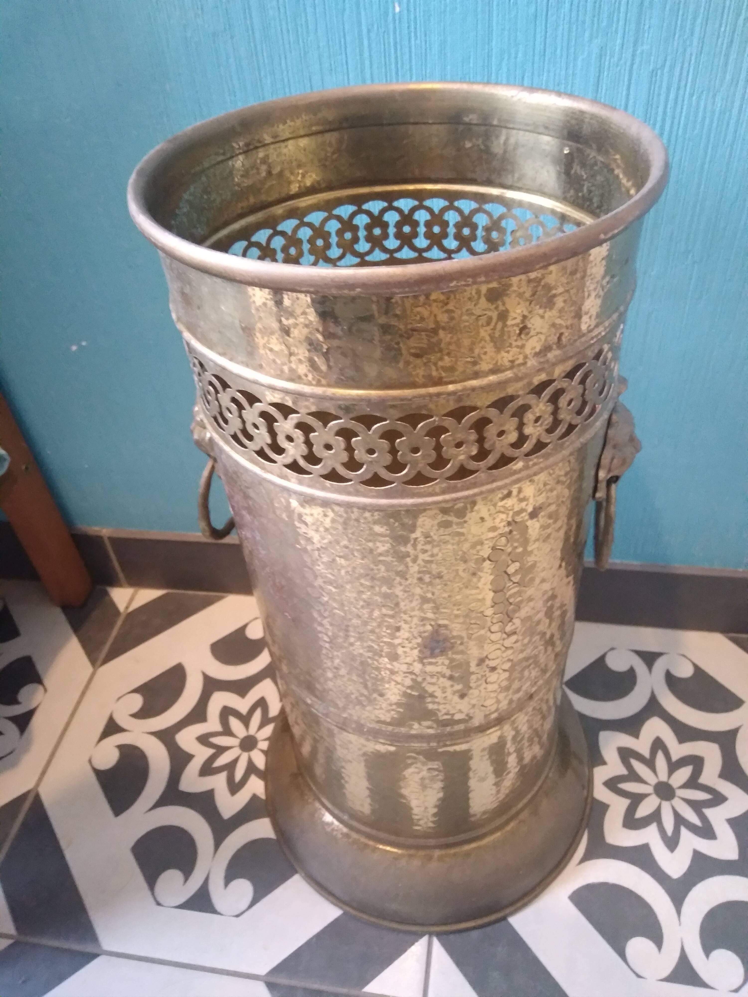 Brass umbrella stand with lion's head