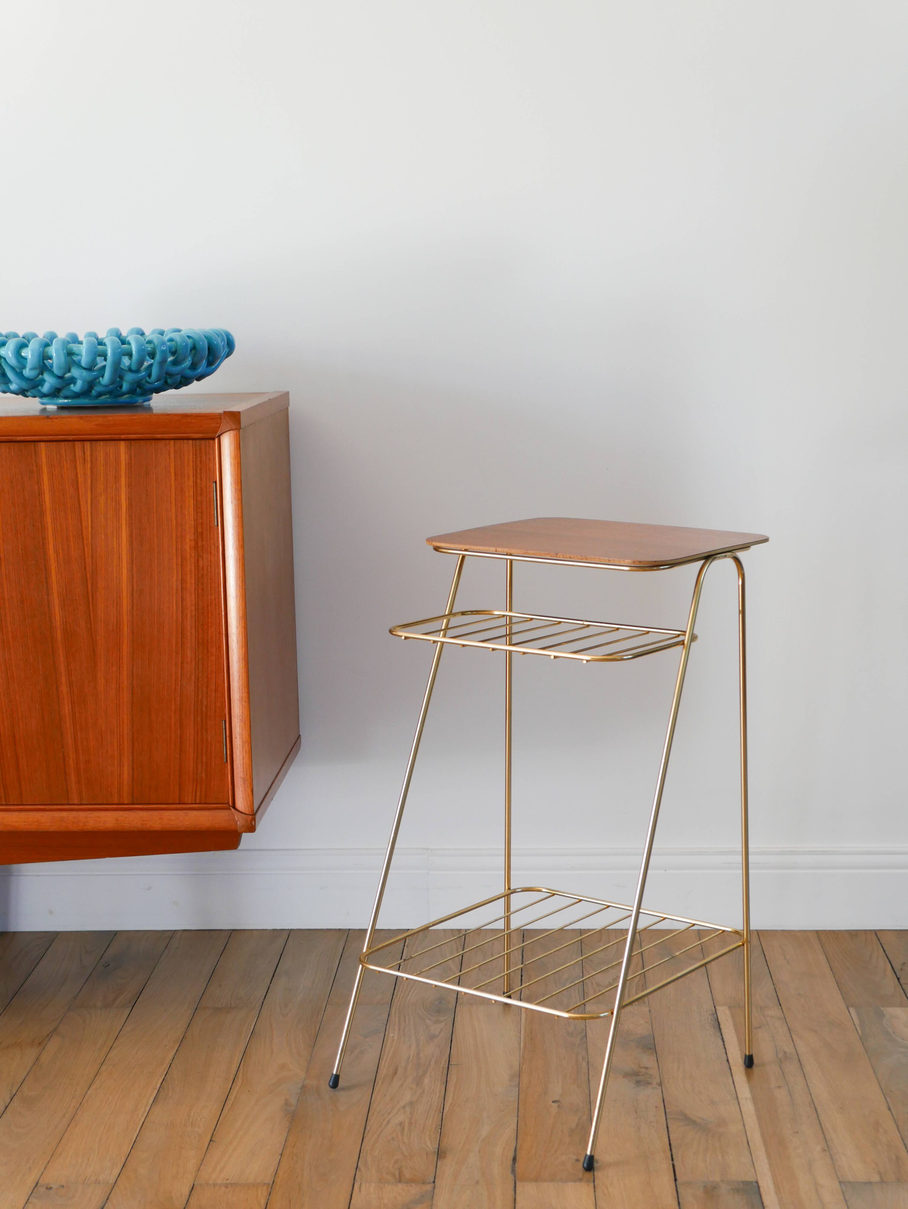 Small brass side table with a teak top, 1960.