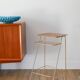 Small brass side table with a teak top, 1960.