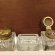Old wooden office inkwell set and glass and brass accessories