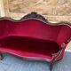 Antique canapé in wood and burgundy velvet in Louis Philippe style.