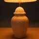 Vintage table lamp in woven ceramic Regency style.
