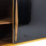 Low ash sideboard with sliding doors. 1960s.