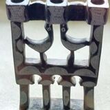 Three-branched stone candlestick adorned with birds, North Africa