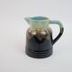Art Deco pitcher in black, brown and blue glazed ceramic