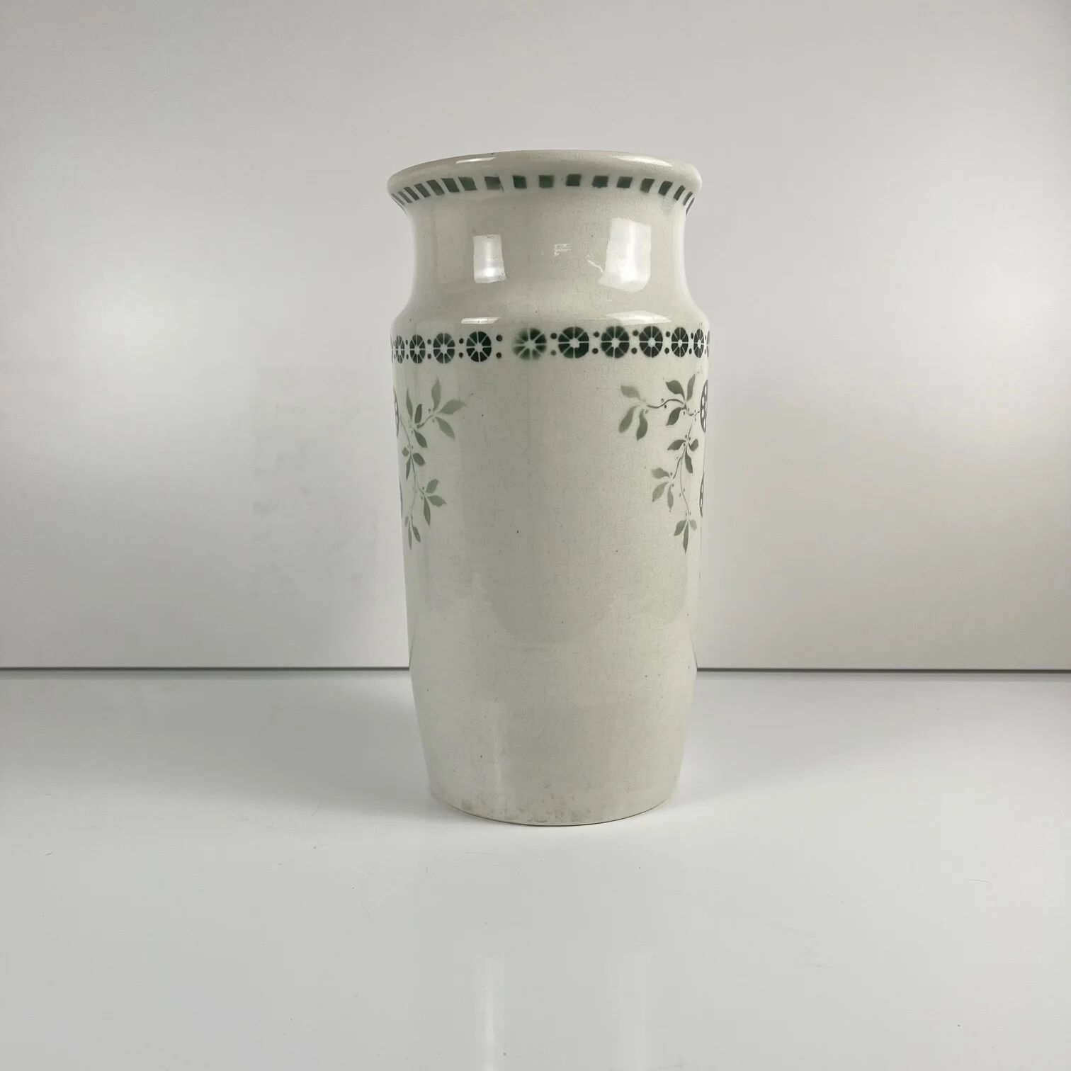 Antique earthenware pitcher, green floral decoration, fine ironstone from the late 19th to early 20th century.