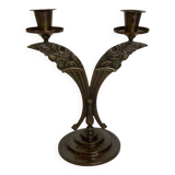 Candle holders in the shape of art deco butterfly wings