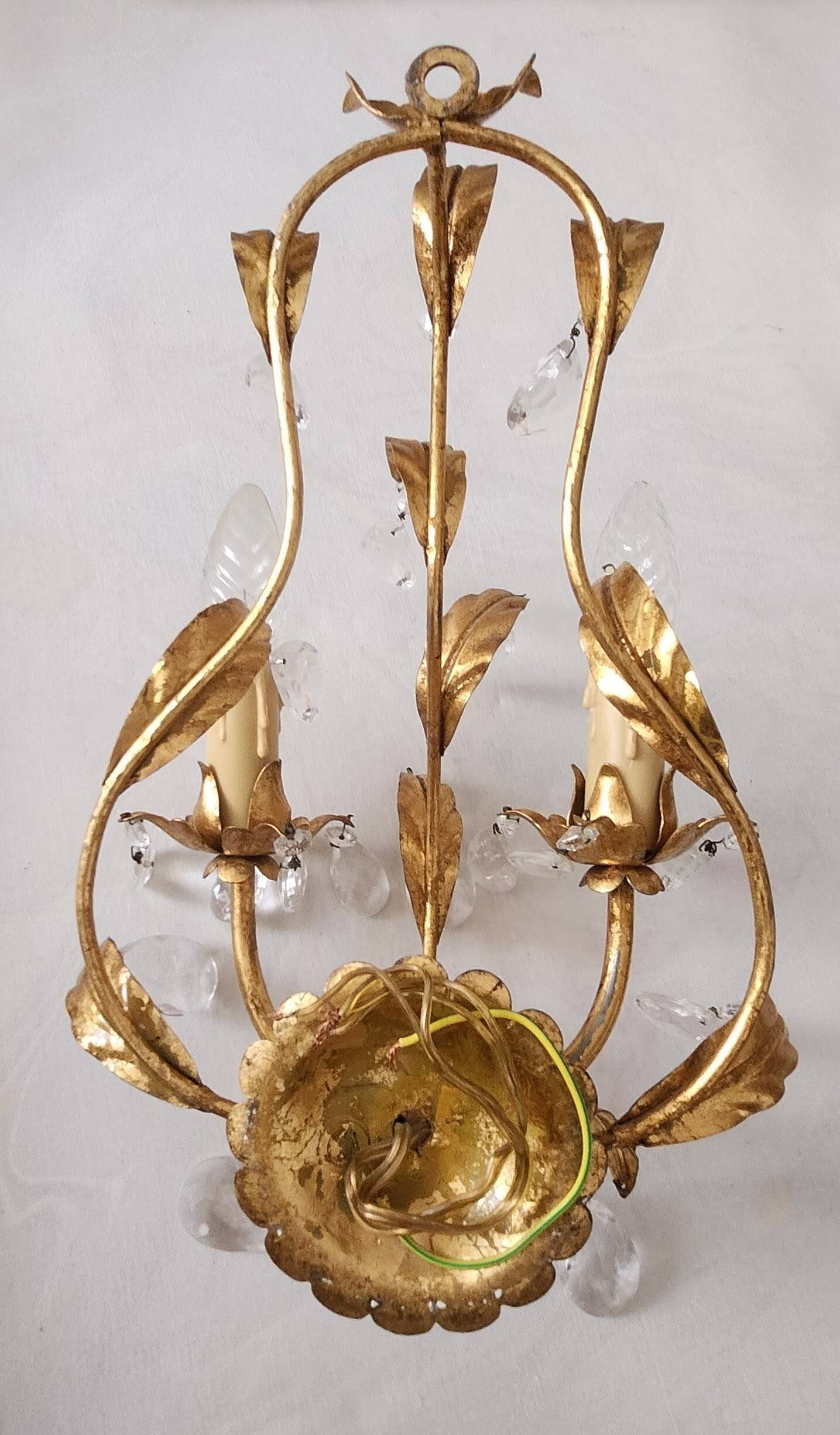 Hand-forged wall lamp gilded with gold leaf and crystals, Italy