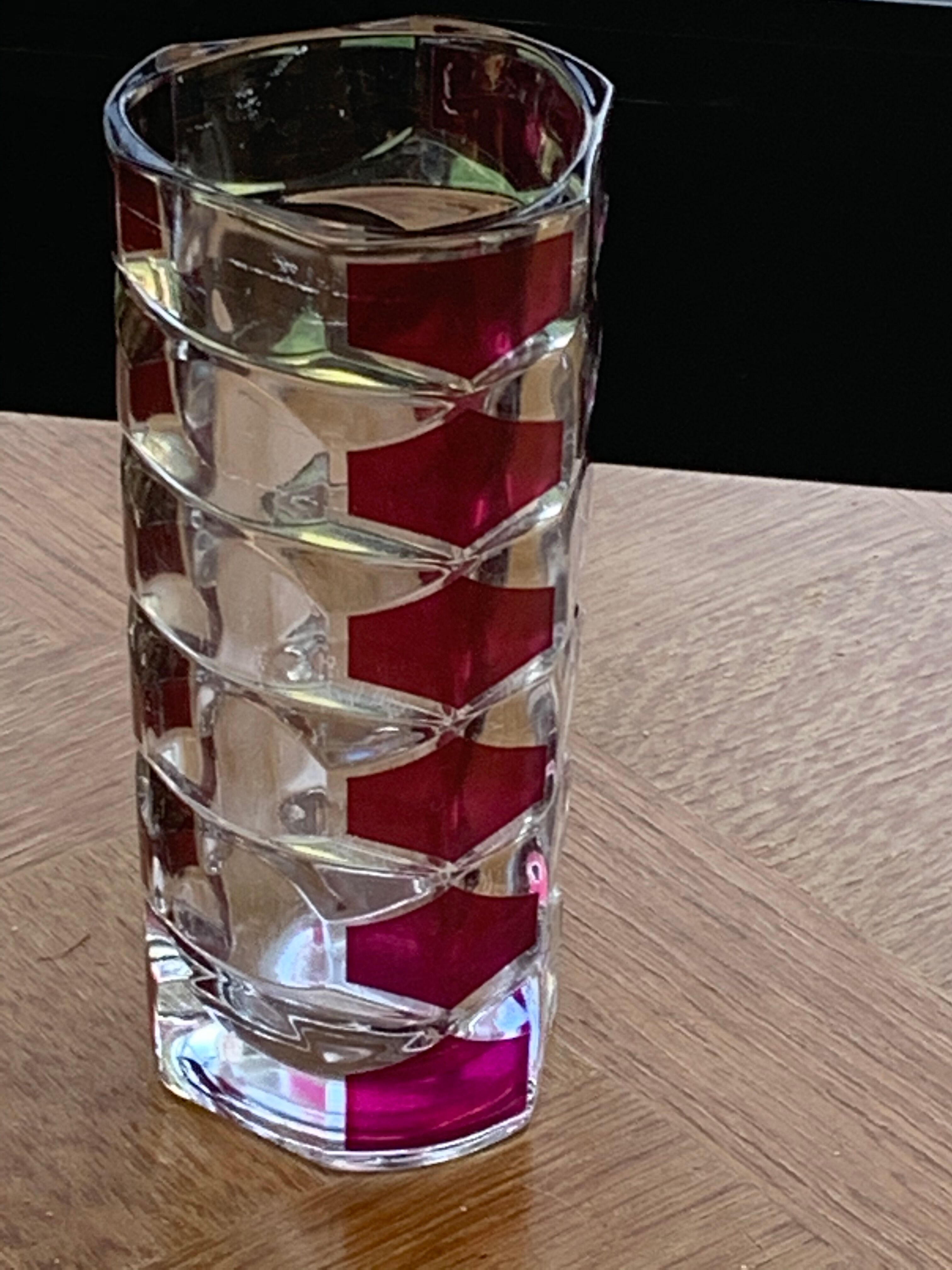 Cylindrical glass vase molded vintage geometric patterns