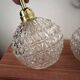 Appliques murales globes en verre