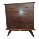 Vintage chest of drawers from the 1950s with wooden legs and a design feature.