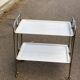 Desserte pliable en acier et bois blanc sur roulettes