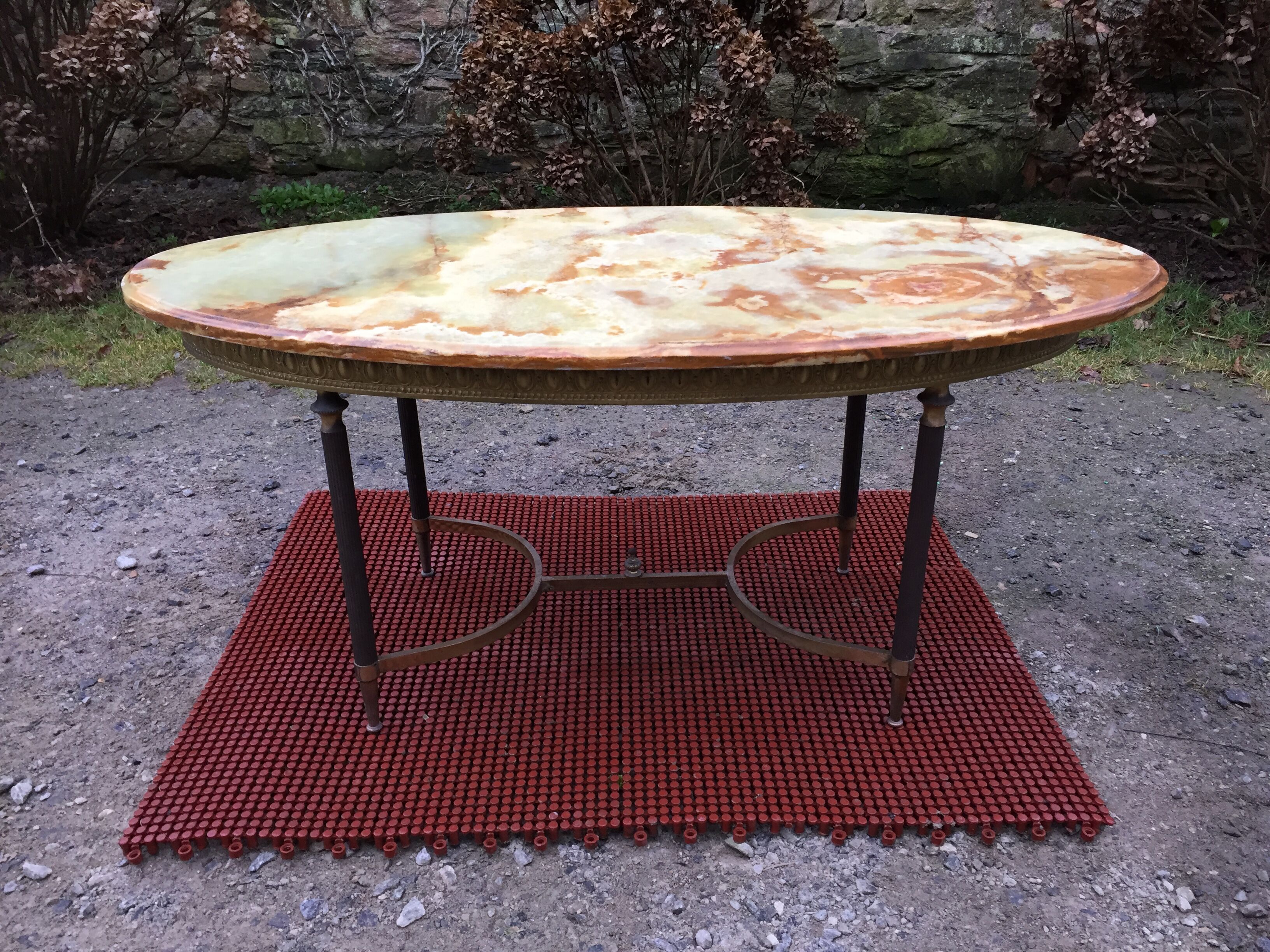 Vintage brass coffee table and oval alabaster top.
