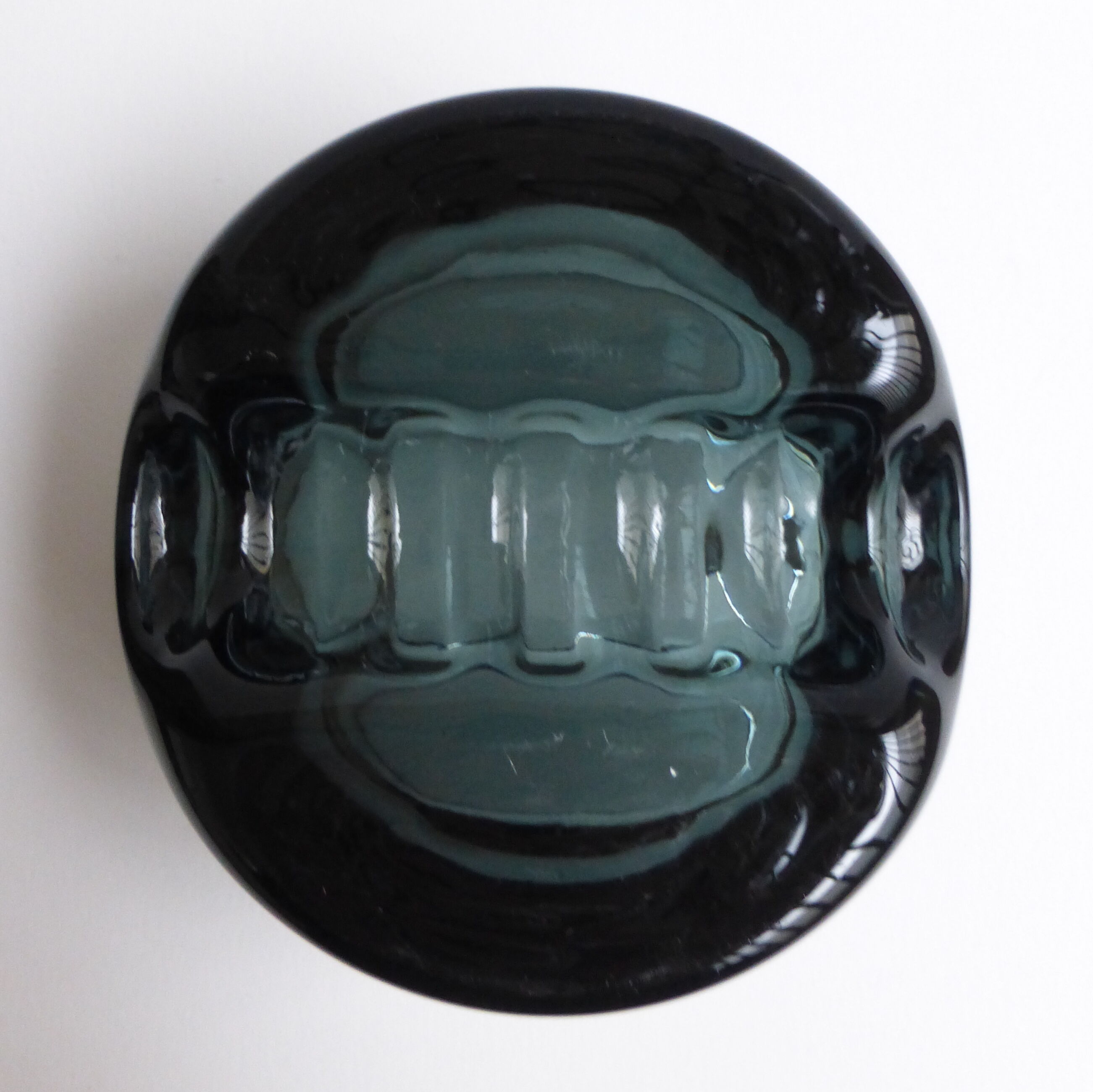 Scandinavian ashtray in 1970's moulded smoked glass