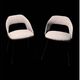 Pair of barrel chairs from the 1950s, in the style of Pierre Guariche.