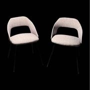 Pair of barrel chairs from the 1950s, in the style of Pierre Guariche.