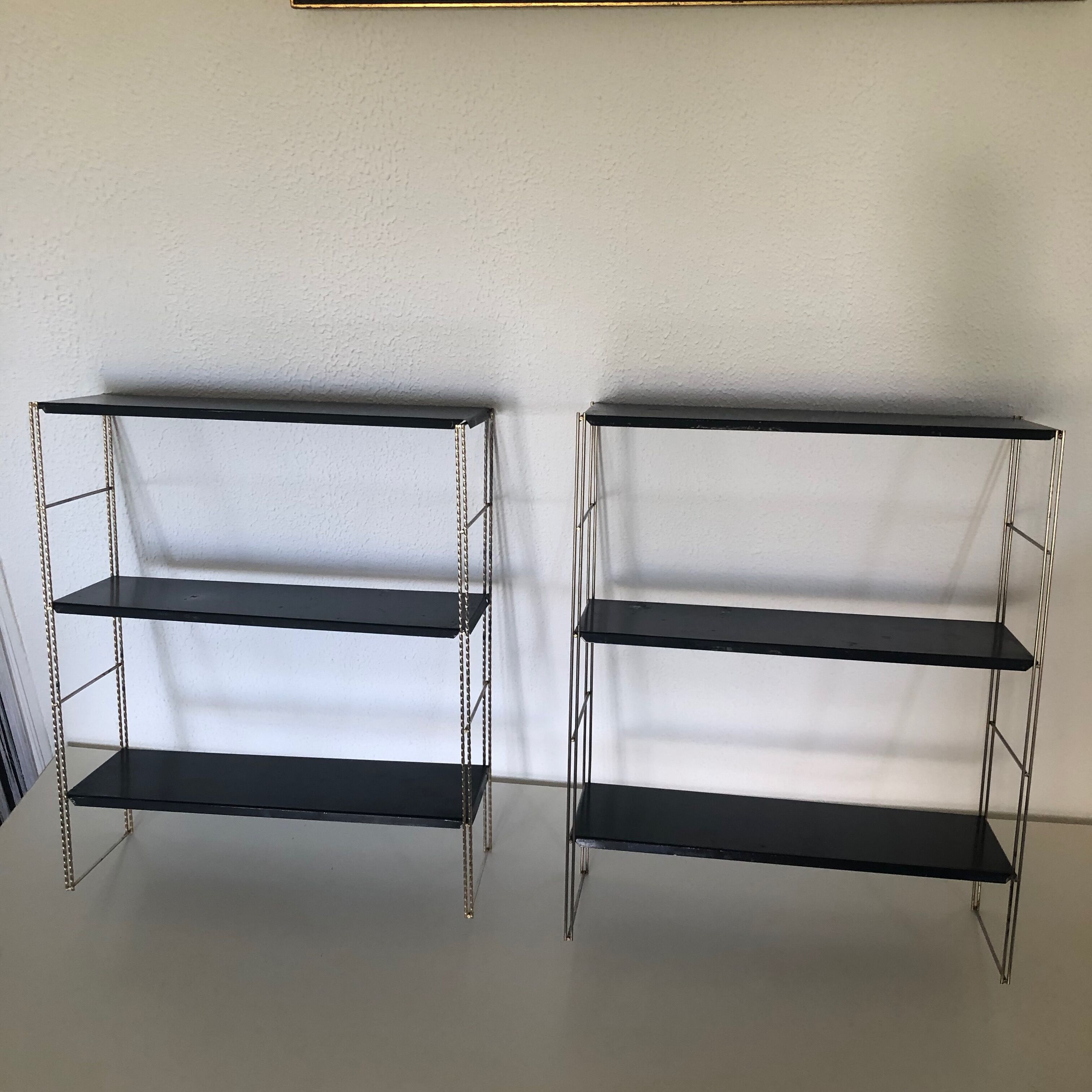 Pair of black string shelves, 1960 - 58x49cm