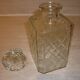 Antique whisky decanter made of chiseled glass