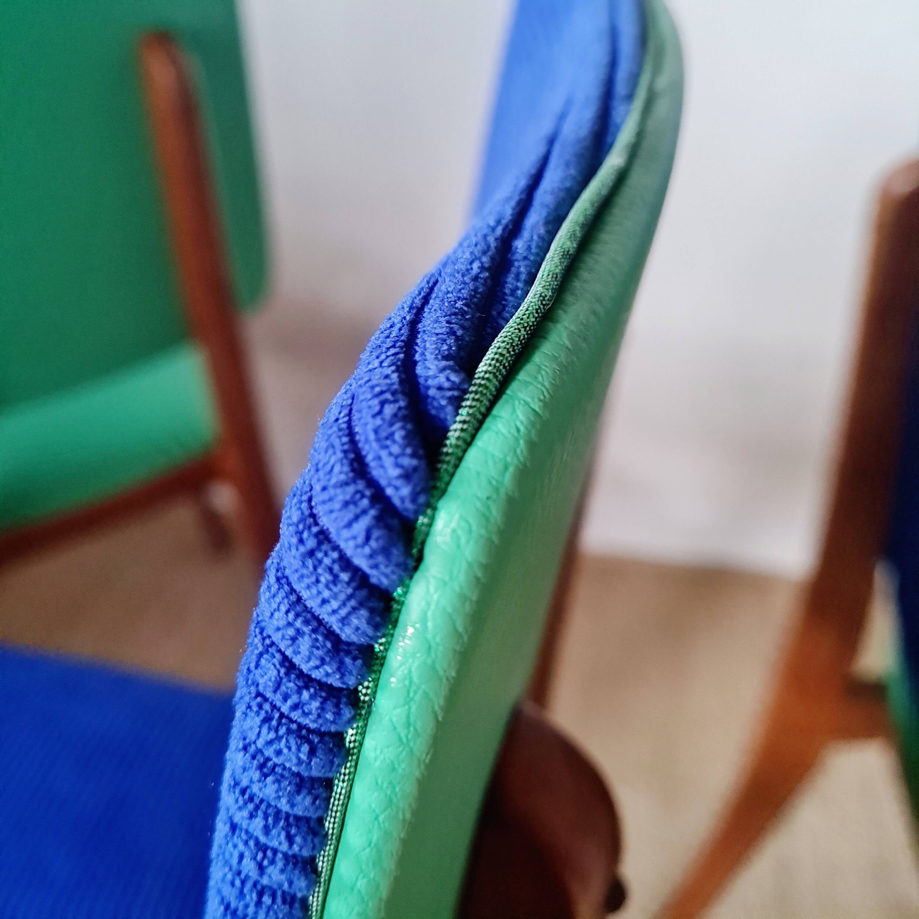 Series of velvet Scandinavian chairs - green and blue.